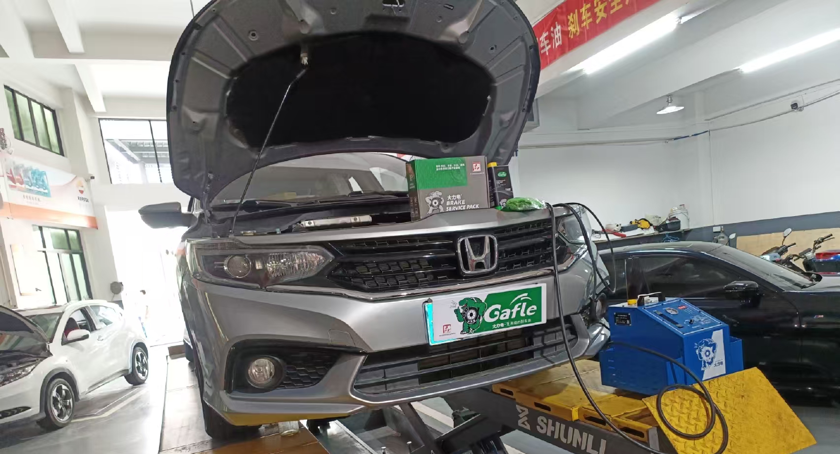 Honda Brake Fluid Service: Clean the System Before Adding New Fluid A Honda Vehicle Receives the Gafle Brake Fluid Maintenance Kit